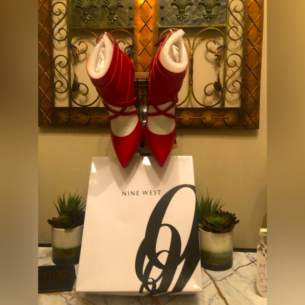 Nine West red pumps with crisscross straps & back zip; perfect holiday shoe